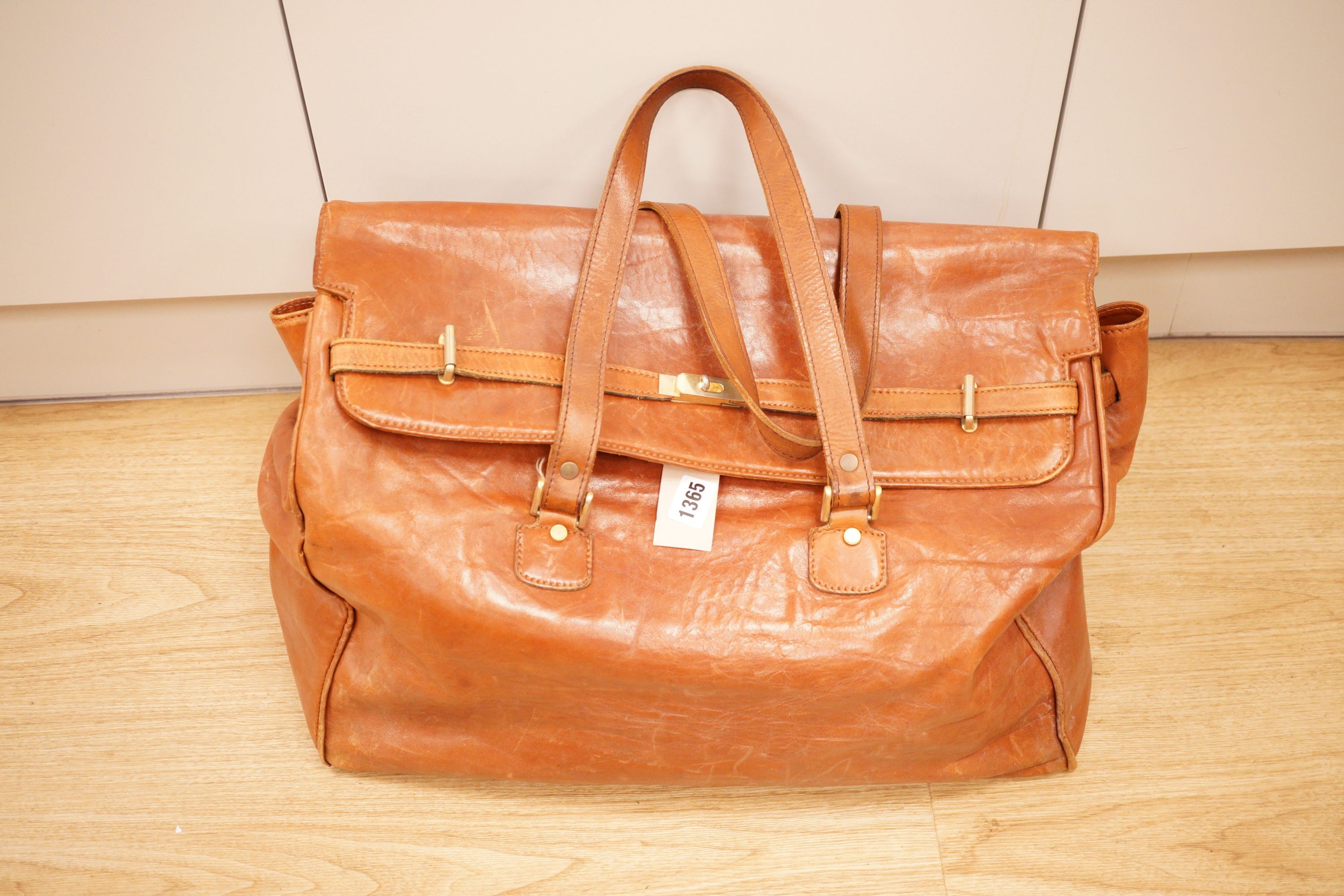 A large Italian brown leather bag